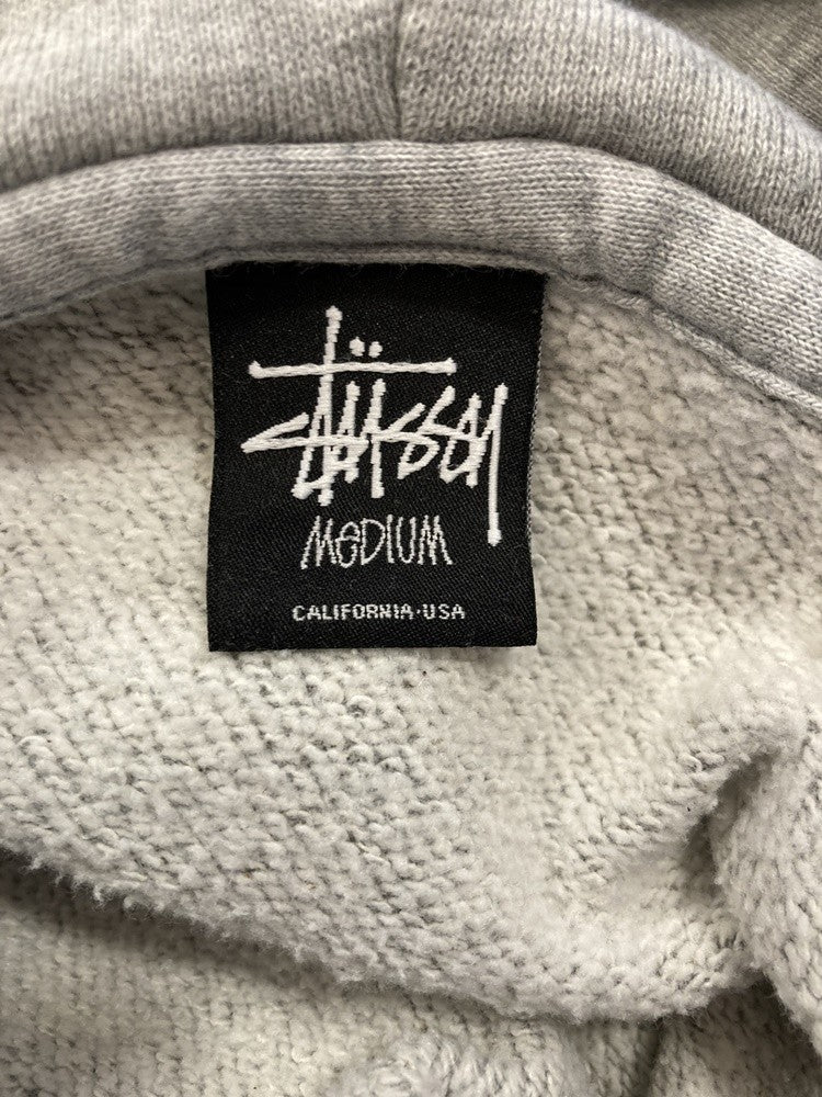 ステューシー STUSSY プルオーバー パーカー フード プリント グレー