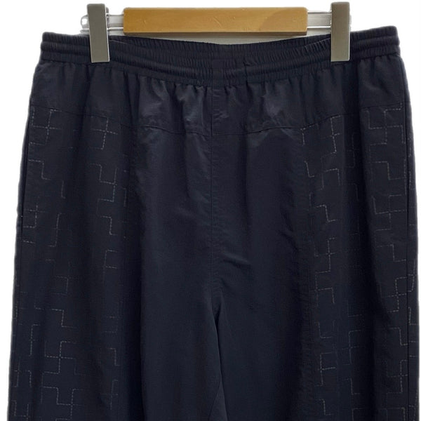 ブルーブルー BLUE BLUE ナイロンリフレクタープリント ウォームアップパンツ 1002168 ボトムスその他 ブラック 2サイズ 201MB-868