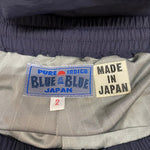 ブルーブルー BLUE BLUE ナイロンリフレクタープリント ウォームアップパンツ 1002168 ボトムスその他 ブラック 2サイズ 201MB-868