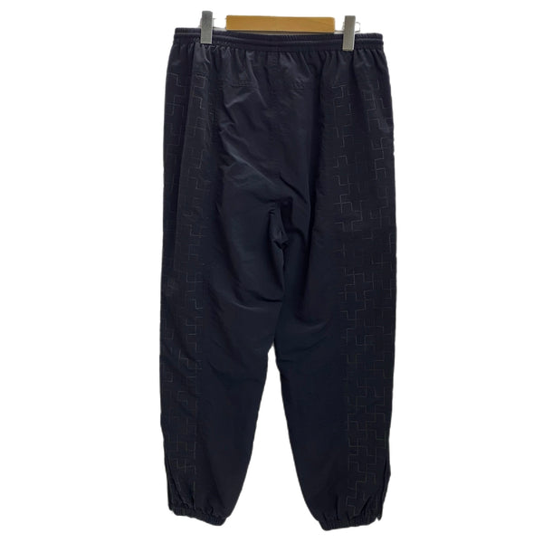 ブルーブルー BLUE BLUE ナイロンリフレクタープリント ウォームアップパンツ 1002168 ボトムスその他 ブラック 2サイズ 201MB-868