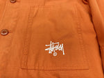 ステューシー STUSSY Torque Jacket トルクジャケット ワークジャケット ライトアウター ミリタリー ステンカラー フロントボタン ロゴプリント ORANGE 橙色 ジャケット ワンポイント オレンジ XLサイズ 104MT-1801