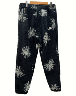 ウィンダンシー WIND AND SEA WDS Palm tree Fleece Pants パーム ツリー フリース パンツ 黒 花・植物 WDS-O-PMT-23-Q2-PT-01 ボトムスその他 ブラック Mサイズ 104MB-85