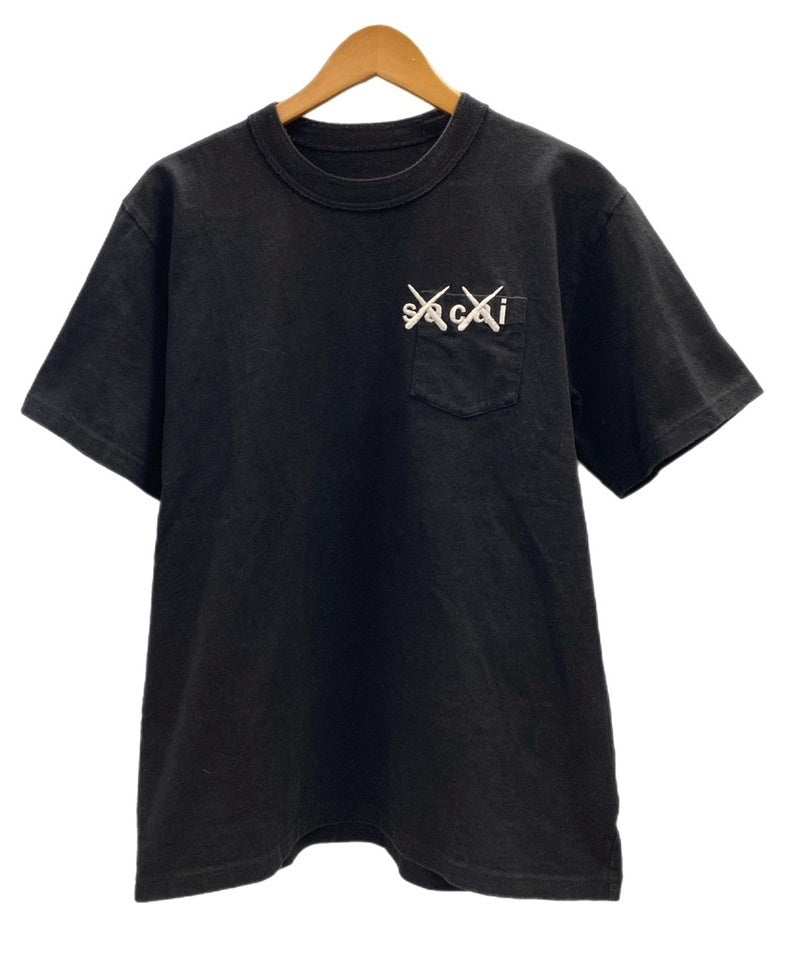 サカイ sacai カウズ KAWS ロゴ ポケットTシャツ 黒 21-0285S サイズ3 Tシャツ ブラック 101MT-3184 |  古着通販のドンドンサガール