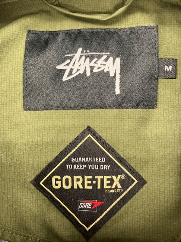 ステューシー STUSSY 16AW GORE-TEX PRODUCTS FISHTAIL JACKET ゴアテックス フィッシュテール ナイロン ジャケット KHAKI 緑 ジャケット ロゴ カーキ Mサイズ 104MT-470