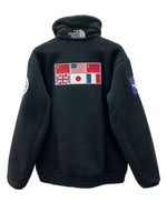 ザノースフェイス THE NORTH FACE TRANS ANTARCTICA FLEECE JACKET トランス アンターティカ フリース ジャケット ジップアップ 国旗 アウトドア 黒 NA72235 ジャケット ロゴ ブラック Mサイズ 104MT-2191