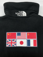 ザノースフェイス THE NORTH FACE TRANS ANTARCTICA FLEECE JACKET トランス アンターティカ フリース ジャケット ジップアップ 国旗 アウトドア 黒 NA72235 ジャケット ロゴ ブラック Mサイズ 104MT-2191