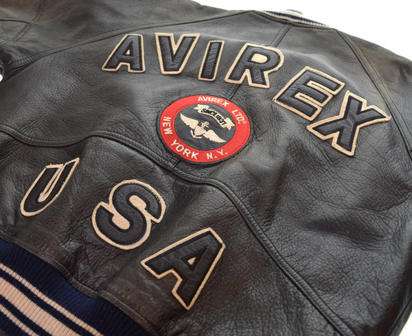 アヴィレックス AVIREX VARSITY LEATHER JACKET バーシティレザージャケット バックロゴ スタジャン ジャケット ブラック Sサイズ 103MT-3520