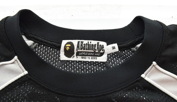 アベイシングエイプ A BATHING APE ソリッドカモジャカードマルチフットボールジャージ 001CSL301312M ロンT ブラック Mサイズ 103MT-3014