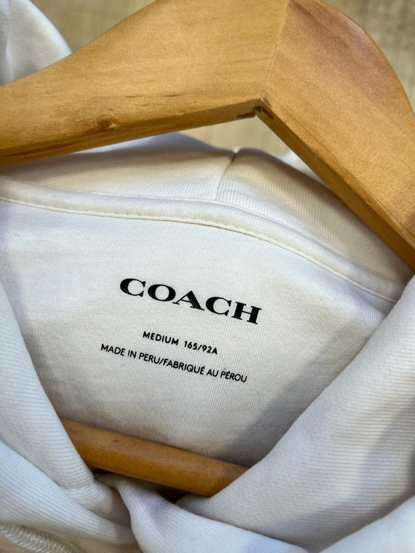 【COACH コーチ】エッセンシャル ワンピースフーディーパーカーオフホワイトM COACH コーチ】エッセンシャル ワンピースフーディーパーカーオフ