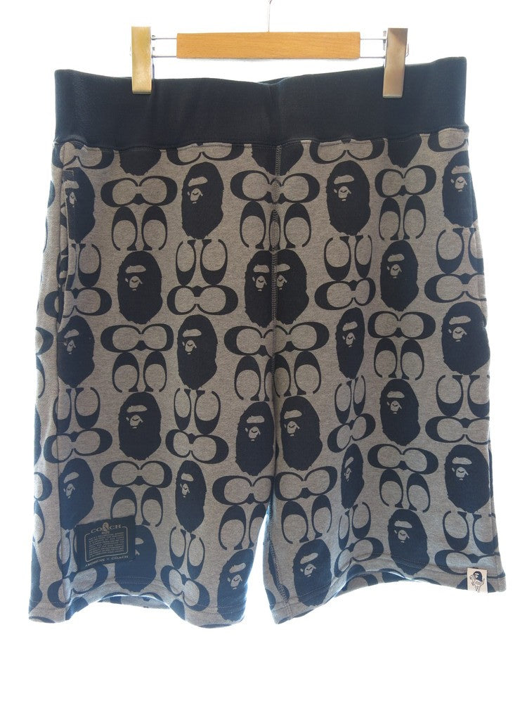 ア ベイシング エイプ A BATHING APE ベイプ コーチ スウェットショーツ Bape x Coach Sweat Shorts 総柄  ネイビー チャーム付き 2021SS ハーフパンツ 総柄 ネイビー Lサイズ 101MB-4 | 古着通販のドンドンサガール