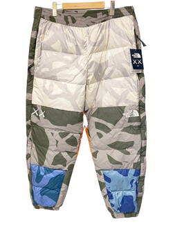 ノースフェイス THE NORTH FACE THE NORTH FACE XX KAWS RETRO 1996 NUPTSE PANT 1996 レトロ ヌプシ テーパード キルト ナイロン Moonlight Ivory ボトム マルチカラー系 ボトムスその他 総柄 マルチカラー LLサイズ XL 101MB-237